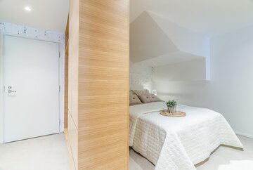 Loft-tyylisen yksiön makuutila
