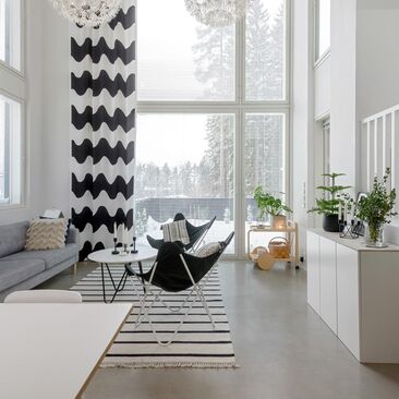 Skandinaavista tyyliä ja betonipintoja olohuoneessa